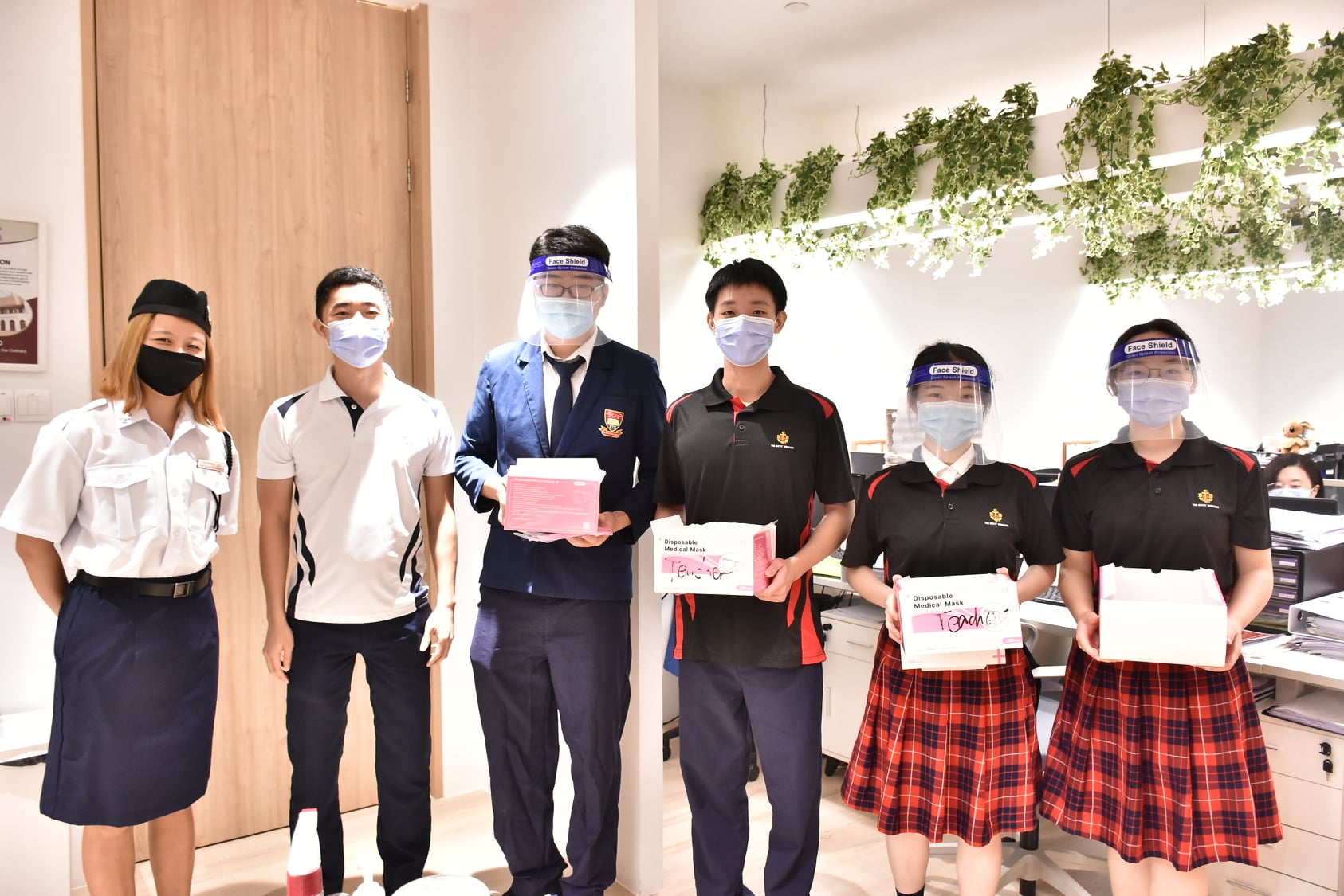 FIS BBGB members giving out masks to Teachers
